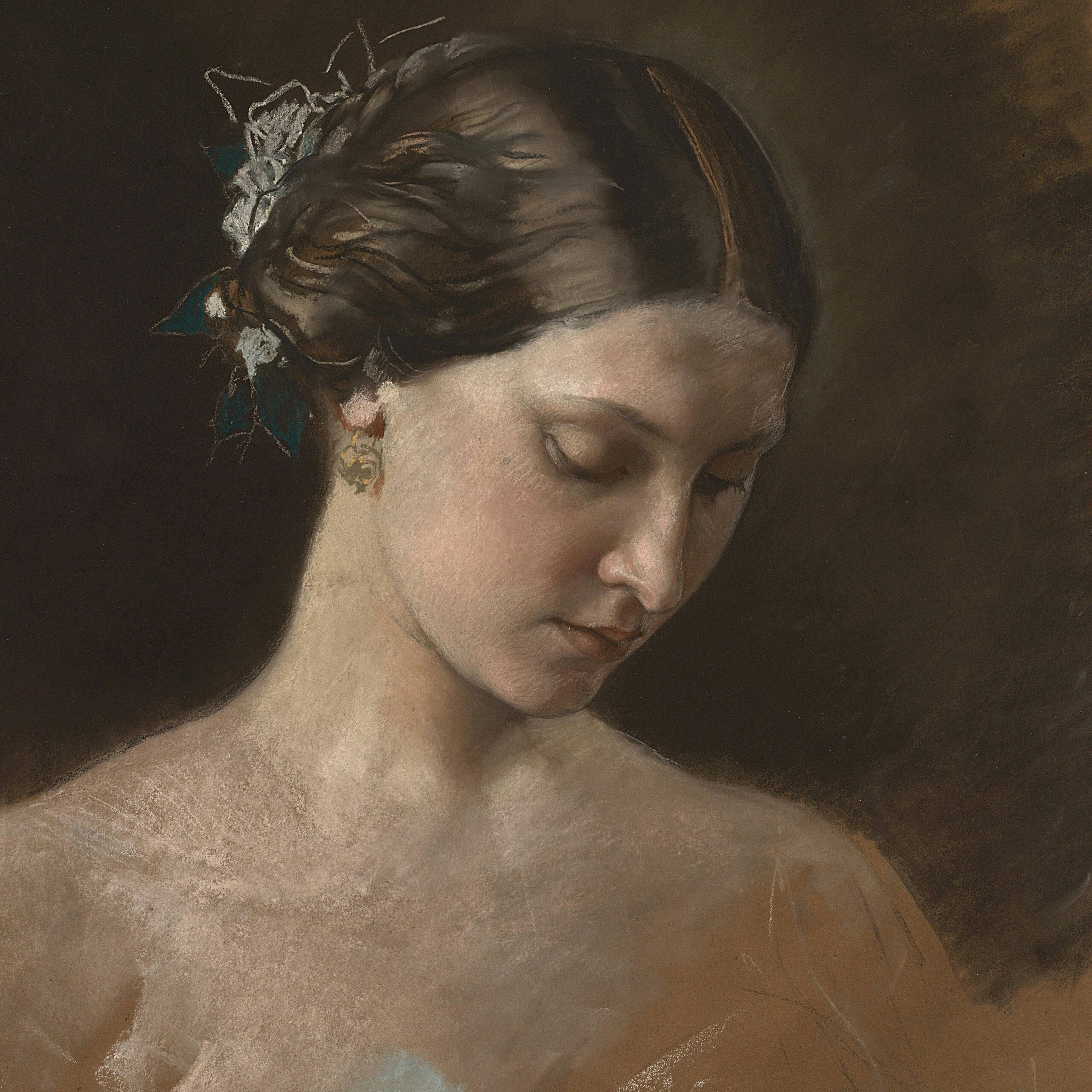 Portrait of a woman wearing antique style earrings representing vintage jewellery