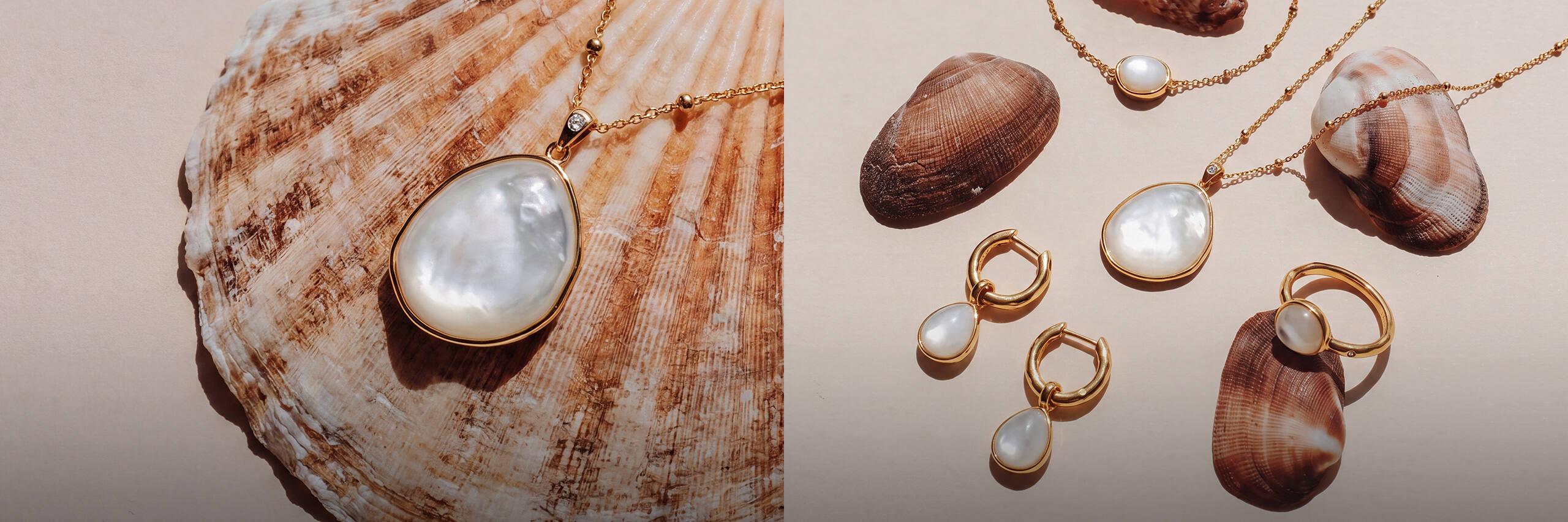Gold and pearl jewellery styled on seashells